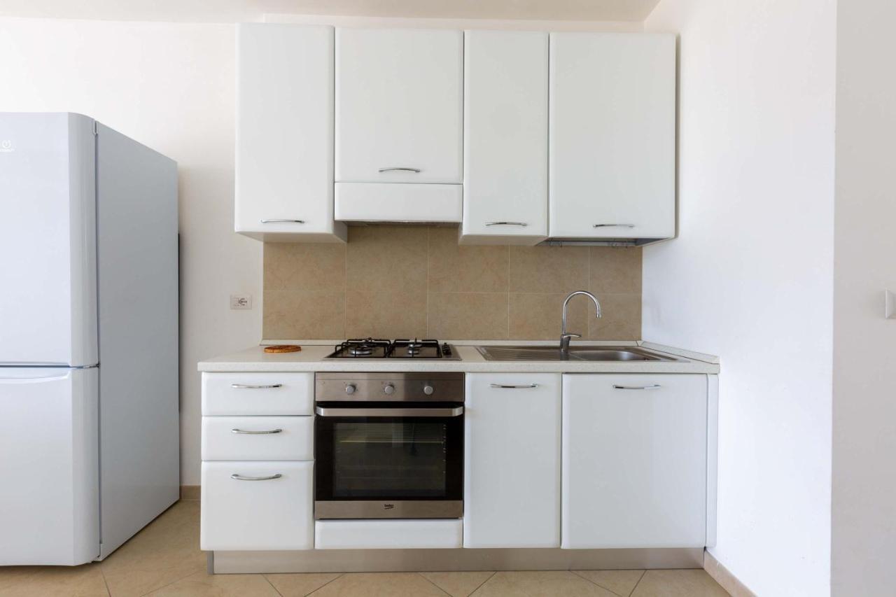 Trilo Damiani by BarbarHouse Apartment Lido Marini Bagian luar foto